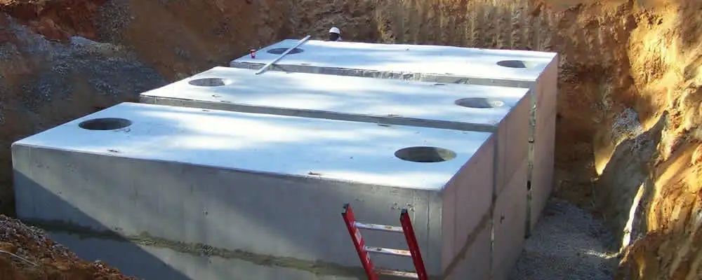 Septic tank installation site with a newly placed concrete tank in Columbus, OH